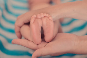 Baby feet in mother hands